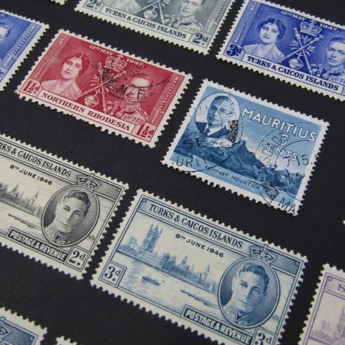 Lot of British commonwealth stamps - mint and used hinged