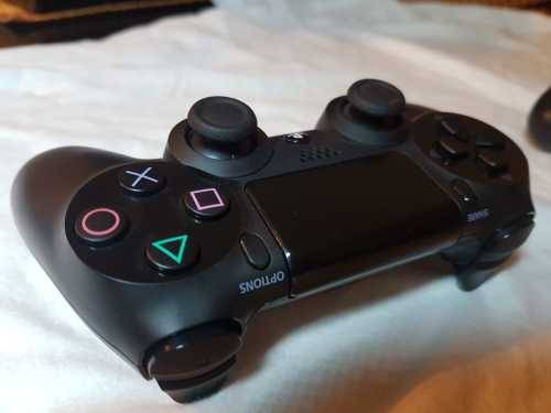 Playstation 4 1TB Console + 2 x Dualshock Controllers (plus 4 games)