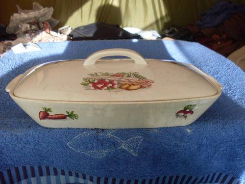 Beautiful old casserole dish with spider veins from heat