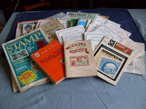 Deceased Estate 28 stamp catalogues. Philatelic Auctions some quite old & not so old P&P60 (heavy)