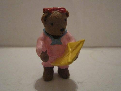 Small Hard Rubber Teddy holding a pallette +-5.5cm from 1995