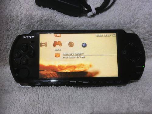 PSP 3004, 512MB Memory Card Charger, 5 Games + 4 UMD Music videos