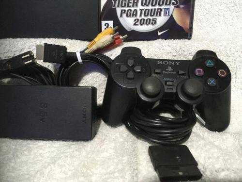 Playstation 2 - Black Slim Line Console c/w 1 x Original Controller, AV Cable PSU and 1 x Game