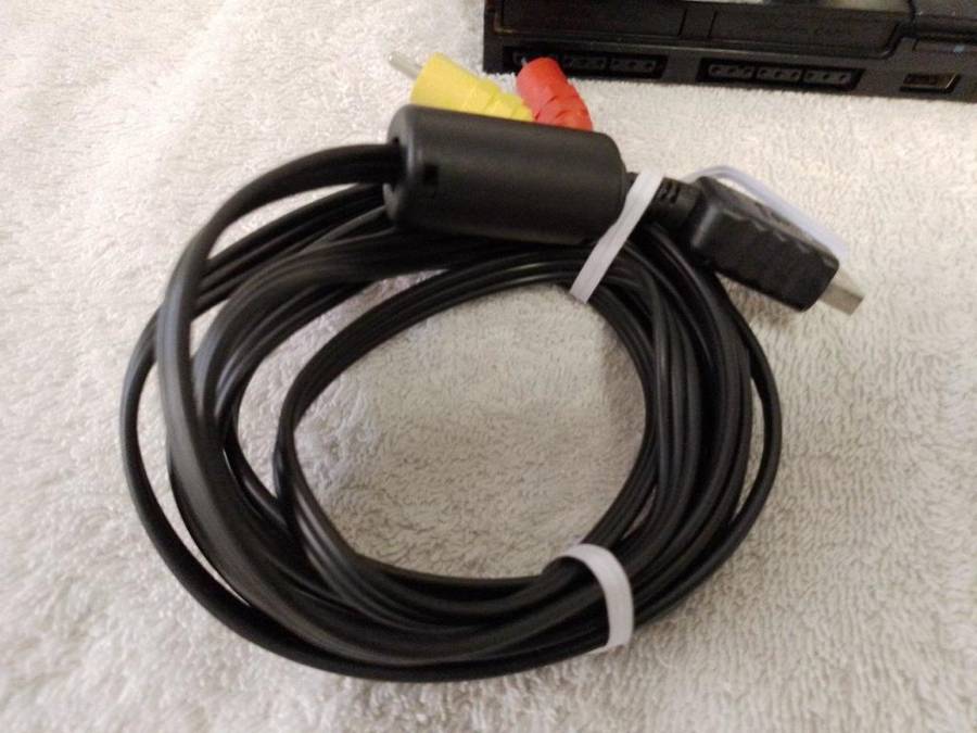 Playstation 2 - Black Slim c/w 1 x New Generic Controller, AV Cable & Power Cord + 2 Games