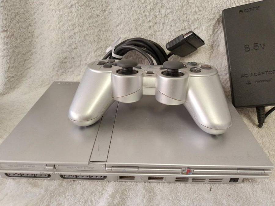 Playstation 2 - Platinum Silver Slim c/w 1 x Official Sony Controller, AV Cable & Power adapter
