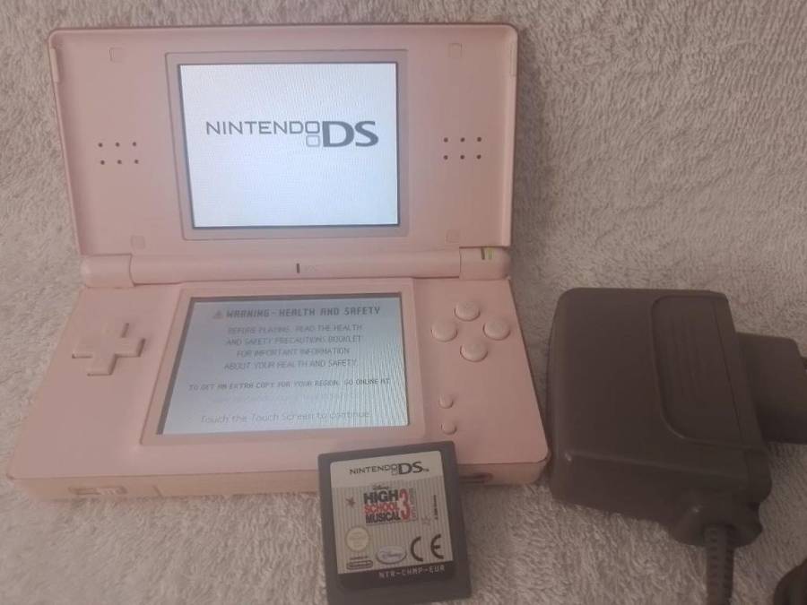 Nintendo DS Lite Pink, c/w Stylus, Charger + High School Musical 3 Cartridge.