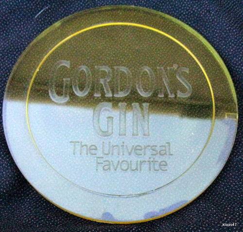 COASTERS : GORDON'S GIN : YELLOW PLASTIC : 10cm DIAMETER