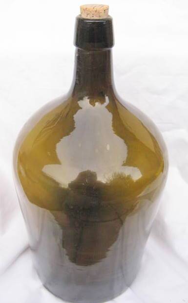 GREEN BOTTLE : HALF DEMIJOHN : 35cm HIGH : BASE DIAMETER 16cm