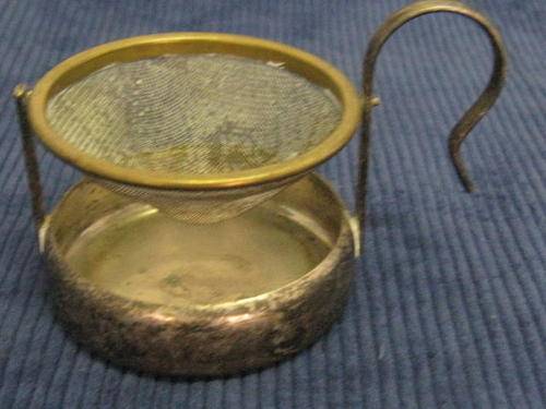 TEA STRAINER ON DRIP STAND : **NOTE - TARNISHED - NOT CLEANED**