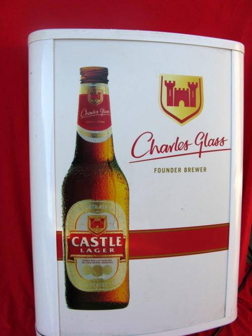 CASTLE LAGER  - CHARLES GLASS :  SIGN WITH LIGHT : 55cm X18cm X73cm : WEIGHS +11KG : METAL & PERSPEX