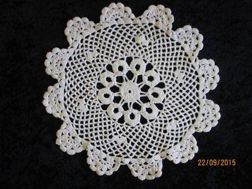 24cm Round White Doillie. small pink stain