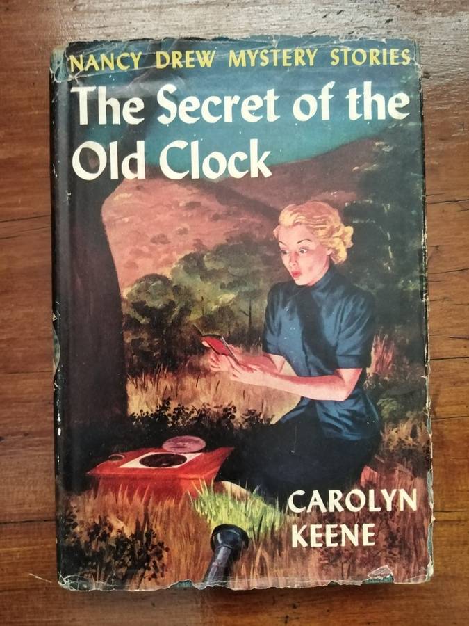 The Secret of the Old Clock - Carolyn Keene. Nancy Drew - MerlinsArrow  Some damage to Jacket