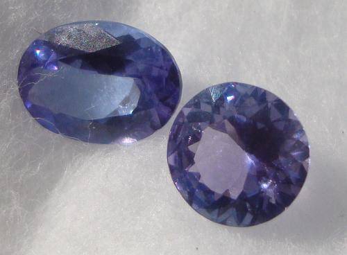 BEAUTIFUL UNMMATCHED HIS/HER PAIR OF TOP QUALITY TANZANITES -** 1.95 tcw  STARTING @ R1 !!!