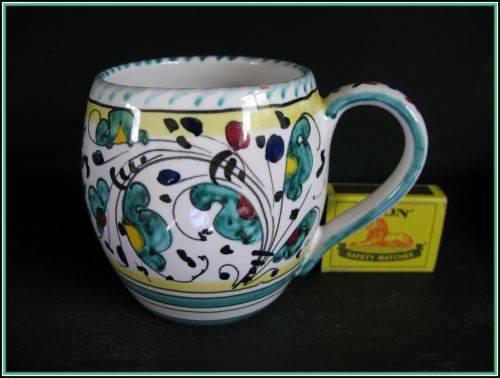 Deruta hand painted pottery a small jug / mug.