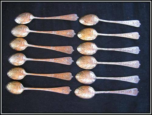 Set of 12 antique tea spoons NS - Nickel Silver with golden sheen.