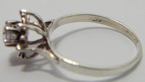 Sterling Silver Ring set with a CZ in a Flower Shaped Setting