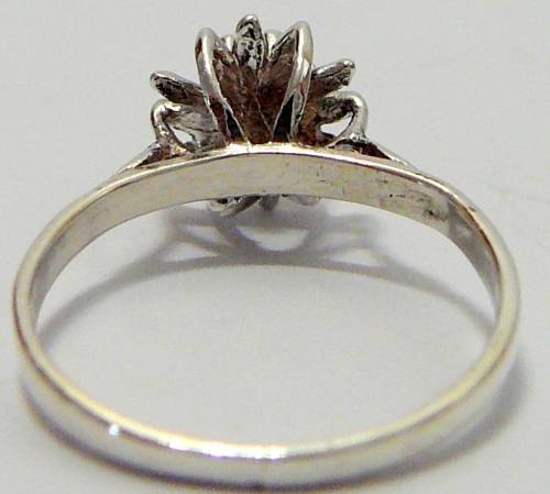 Sterling Silver Ring set with a CZ in a Flower Shaped Setting