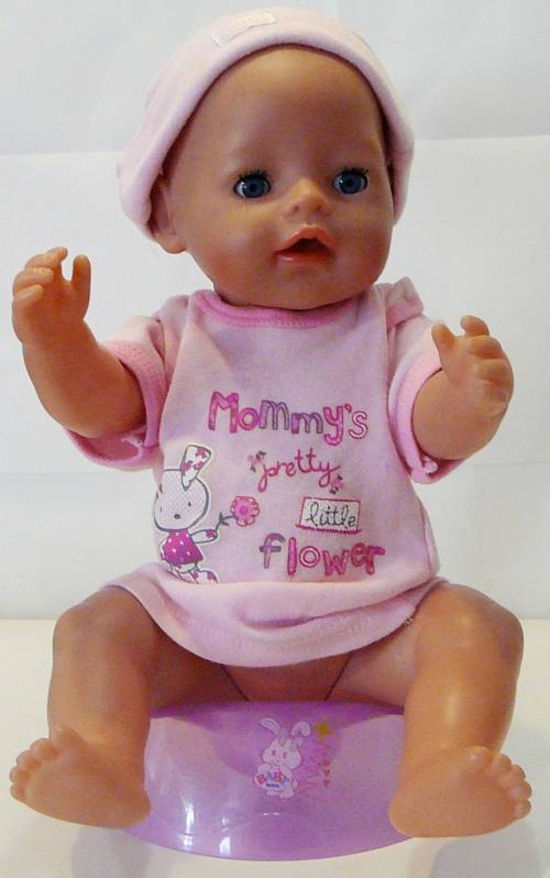 ZAPF Creations - Baby Born Doll in Stroller with A Bag of Clothing and a Potty