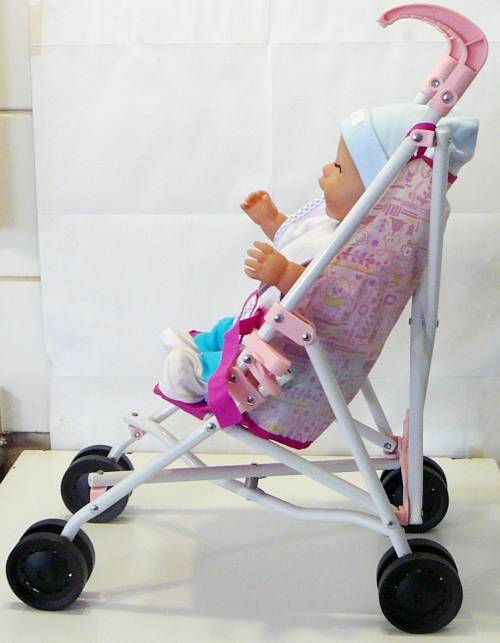 ZAPF Creations - Baby Born Doll in Stroller with A Bag of Clothing and a Potty