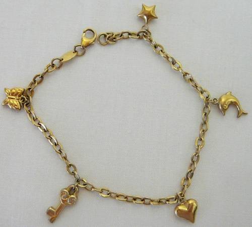 9 ct Gold Plated Silver Charm Bracelet with 5 Charms.
