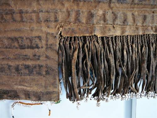 A Hand Made Glass Bead and Leather African Wall Hanging