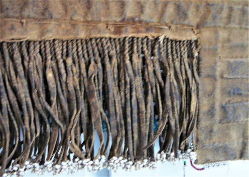 A Hand Made Glass Bead and Leather African Wall Hanging