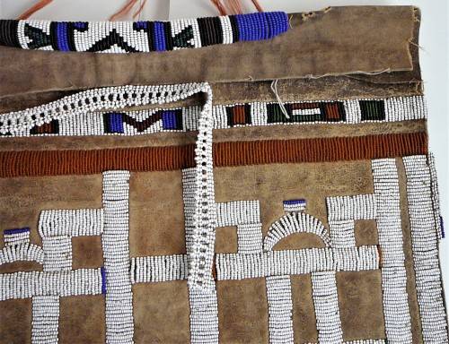 A Hand Made Glass Bead and Leather African Wall Hanging