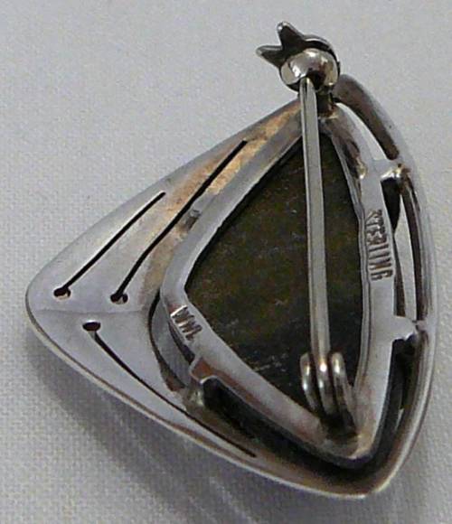 A Beautiful Hawk Eye Stone Brooch set into Sterling Silver