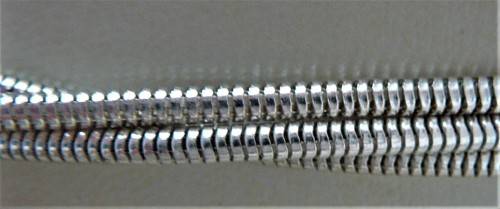 An Elegant Three Chain Silver Coloured Necklace