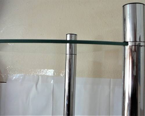 A Three Shelf Glass and Chrome Corner Unit