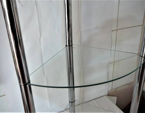 A Three Shelf Glass and Chrome Corner Unit