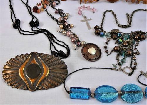 An Assortment of Costume Jewellery - Necklaces and Brass Buckles