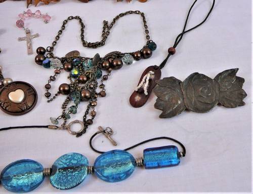 An Assortment of Costume Jewellery - Necklaces and Brass Buckles