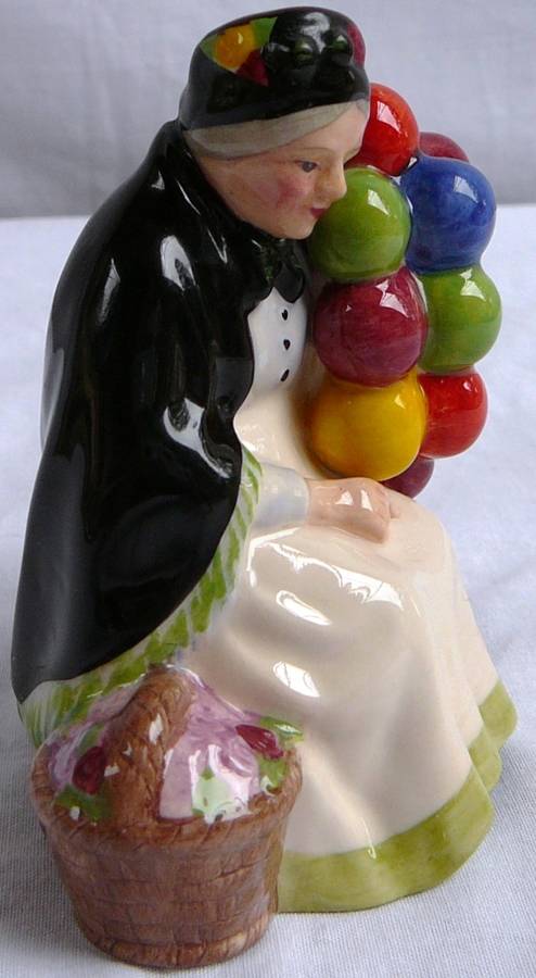 A Royal Doulton Miniature from the Street Vendors Series The Old Balloon Seller