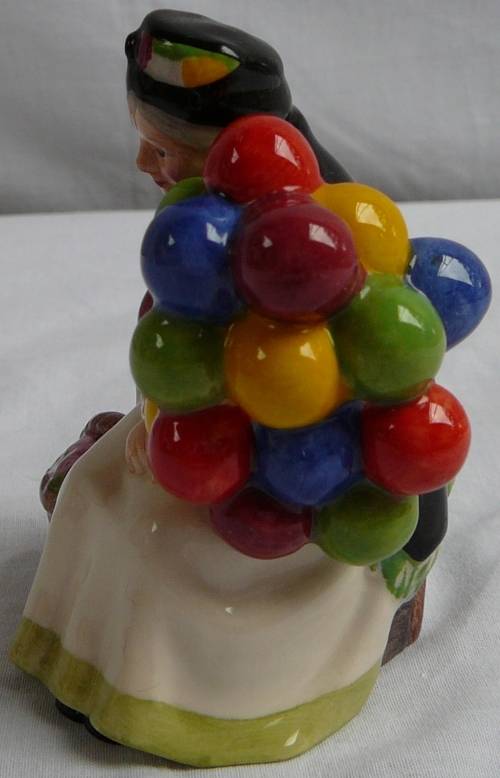 A Royal Doulton Miniature from the Street Vendors Series The Old Balloon Seller