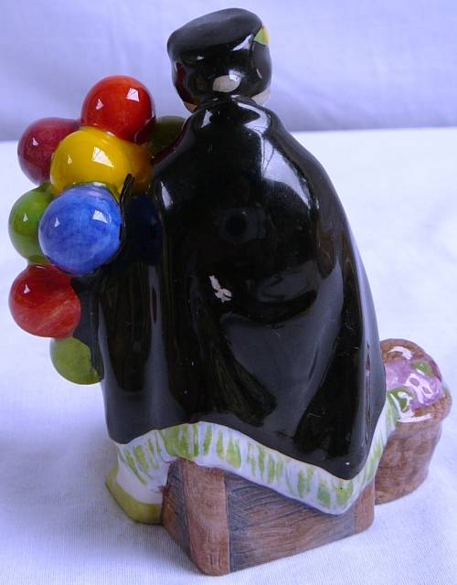 A Royal Doulton Miniature from the Street Vendors Series The Old Balloon Seller