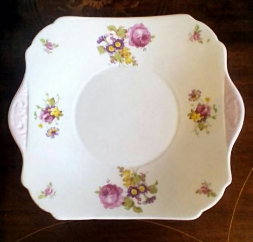 Beautiful fine  porcelain large cake plate  by Shelley. Pretty pink edged floral design.