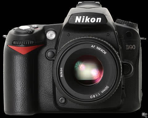 Nikon D90 Camera (Including Nikon 55-200mm Lens ,SD Card, Bag and Tripod)