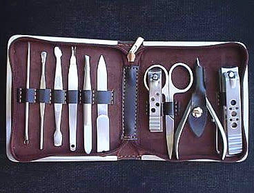 11 PIECE STAINLESS STEEL PEDICURE SET IN SILVER CASE - IDEAL FOR HOME USE - A MUST WHEN TRAVELLING !