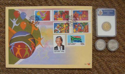 NELSON MANDELA COMBO COINS WITH A RARE 10 YEARS OF DEMOCRACY FDC WITH HIS INAUG STAMPS