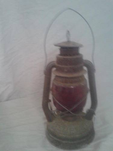 Old Chamway tempest lantern with red glass