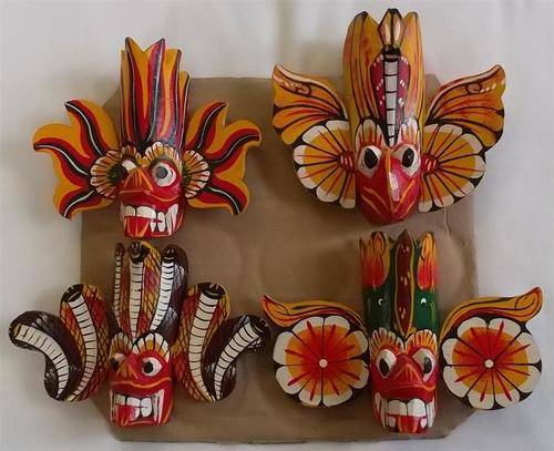 Set of 4 Small  Wooden Hand carved Face Masks.