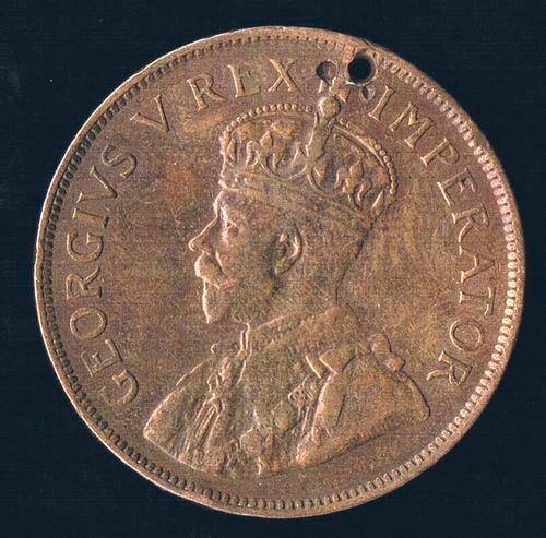 1929 1D PENNY. ZUID AFRICA. HOLED