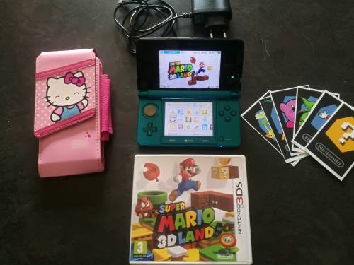 Nintendo 3DS with accessories and 29 games
