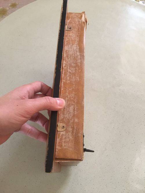 A AMAZING FRAMED BOXED SHELF WITH BOOKS AND PORCELAIN VASE