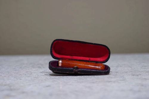Antique cased amber cigar holder