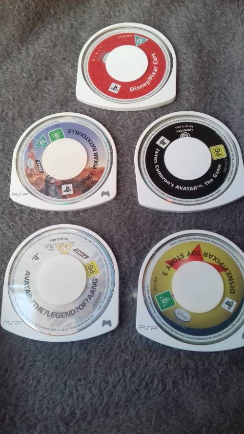 PSP, 5 games, charger and a PSP converter