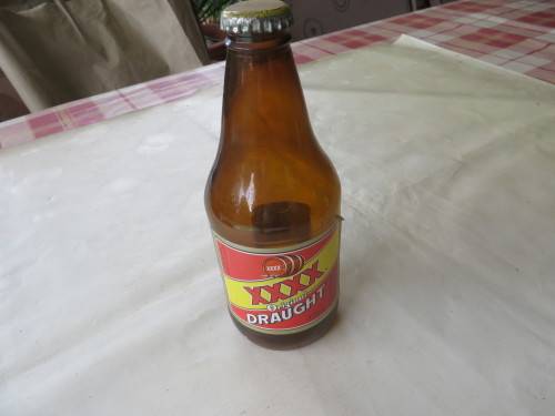 EMPTY BEER BOTTLE - XXXX DRAUGHT  - AUSTRALIA - AS PER SCAN B2