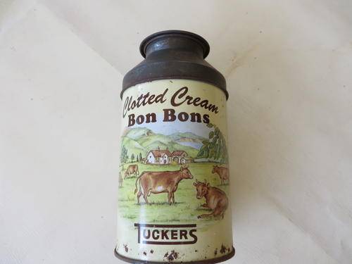 TIN BOX - 65 MM DIAM. - 120 MM HIGH - TUCKER'S CLOTTED CREAM BONBONS - CAN'T OPEN THE LID