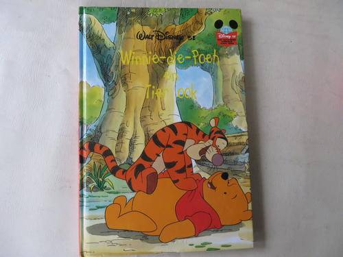 WALT DISNEY - WINNIE-DIE-POEH EN TIER OOK - GOOD CONDITION, SOME WEAR AND TEAR ON COVER